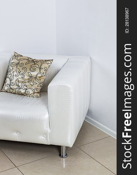 White leather armchair in a modern apartment