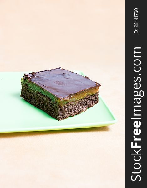 Slice of chocolate Cake. Sachertorte on a green plate. Slice of chocolate Cake. Sachertorte on a green plate