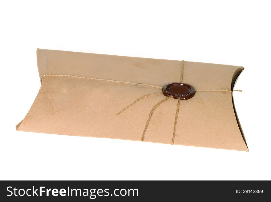 Parcel with rope and wax seal isolated on white background