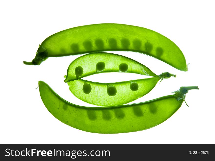 Transparent pea slices on white background
