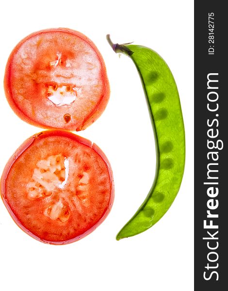 Transparent pea and tomato slices on white background