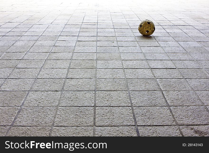 An old rattan ball place on the floor. An old rattan ball place on the floor.