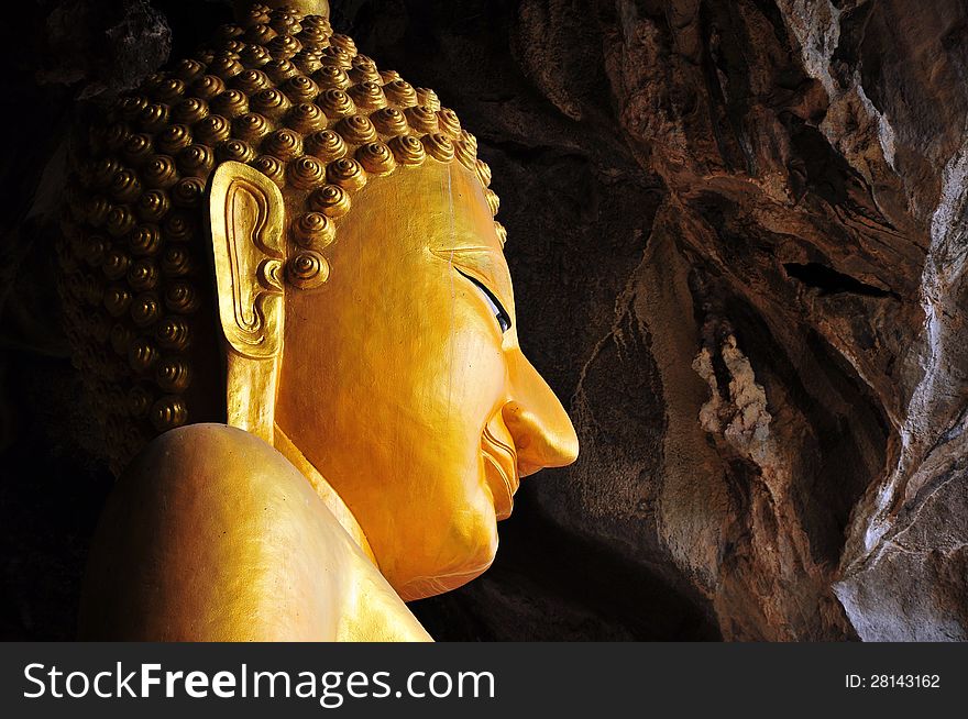 Buddha image in the cave, thailand