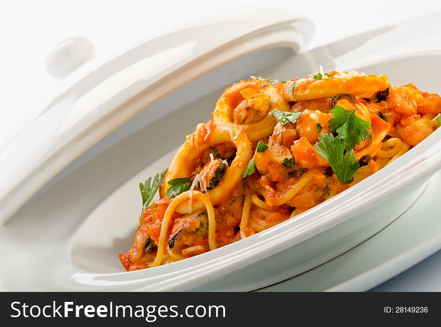 Seafood spaghetti on white dish