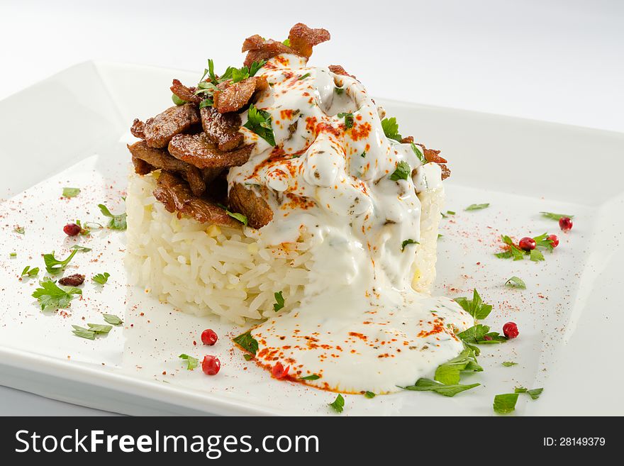 Tandoori pork with rice and cream