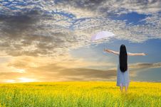 Asian Girl Holding Pink Umbrella In Grass Field Stock Photo Asian Girl Holding Pink Umbrella In Grass Field Stock Photo