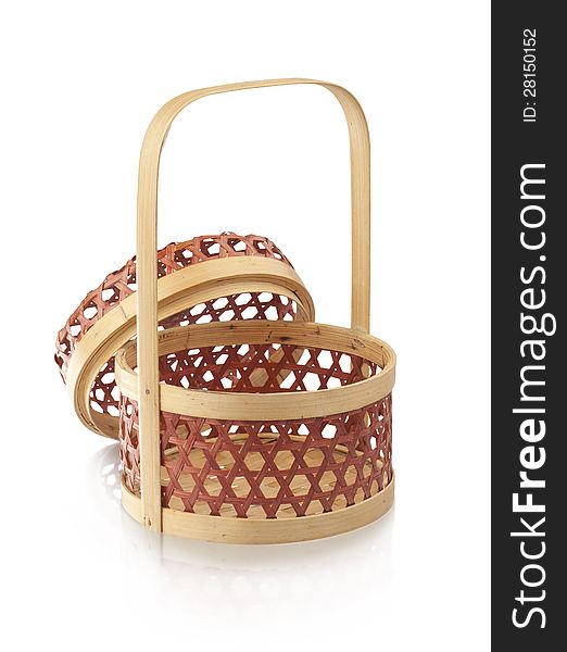 Bamboo wicker basket isolates on white background. Bamboo wicker basket isolates on white background