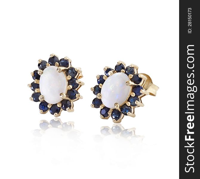 Nice design of the diamonds and sapphire earrings on white