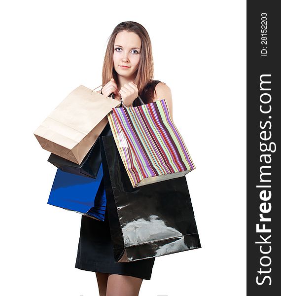 Beautiful woman with shopping bag. Isolated on white background.