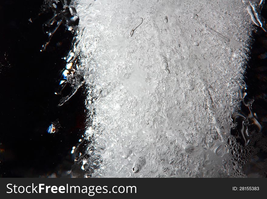 Frozen water with air bubbles. Frozen water with air bubbles.