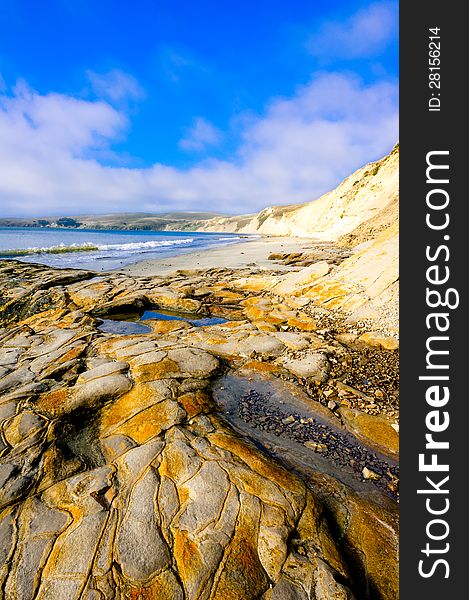 Beautiful landscape of rock formation and long coastline in a sunny day. Beautiful landscape of rock formation and long coastline in a sunny day