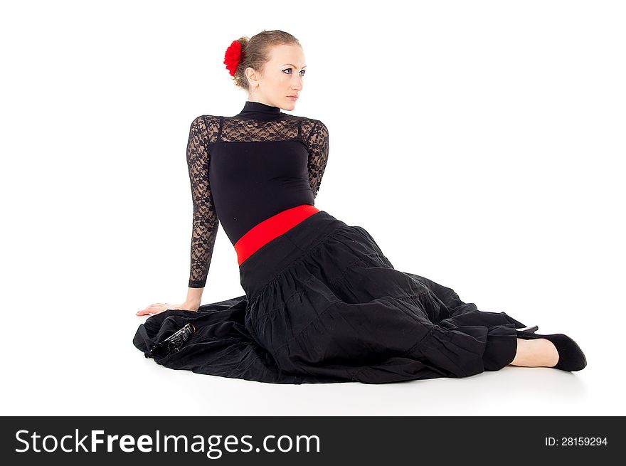 Young girl in flamenco dress sitting. Young girl in flamenco dress sitting