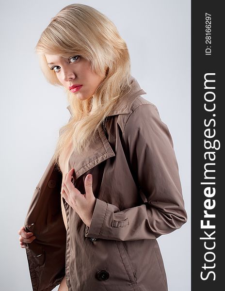 Woman Taking Jacket Off