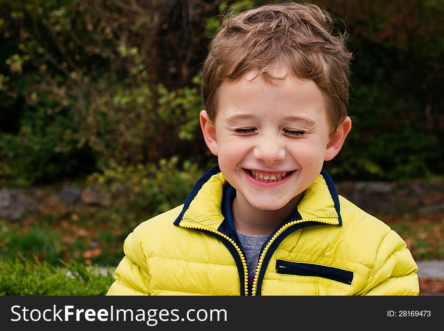 Smiling boy with closed eyes. Smiling boy with closed eyes
