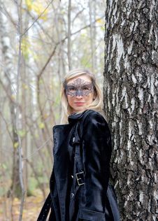 Woman In A Carnival Half-mask Stock Photo