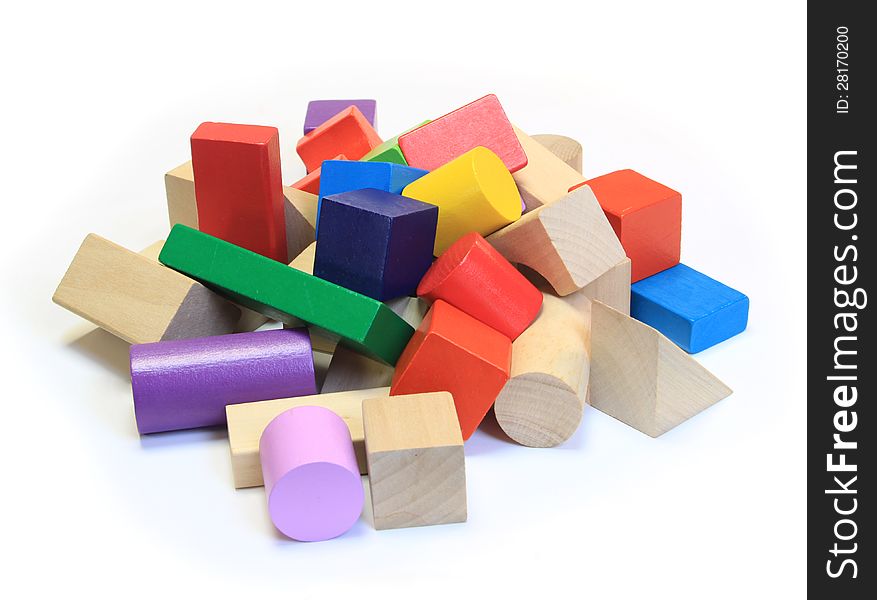 Stack of colorful wooden building blocks on a white background