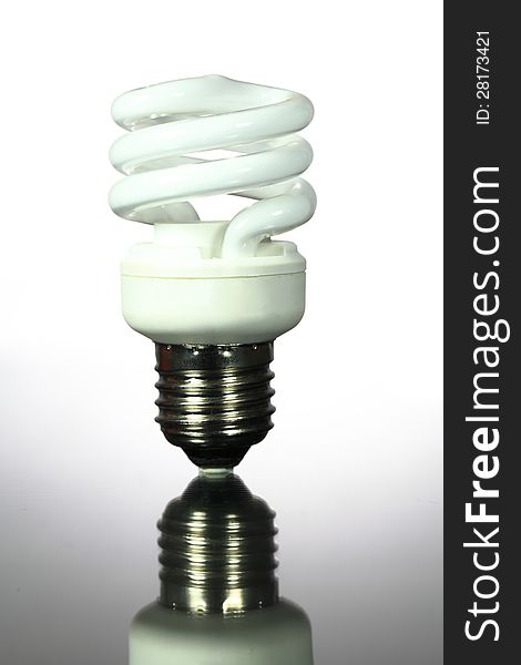 Energy saving lamp on white background.