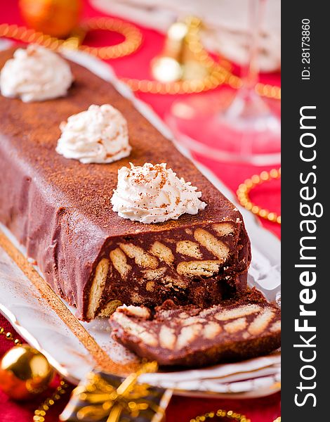 Photograph of a fancy frozen chocolate cake for christmas. Photograph of a fancy frozen chocolate cake for christmas