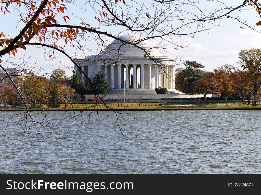 Washington DC, Thomas Jefferson Memorial in autumn with yellow tree branches foreground