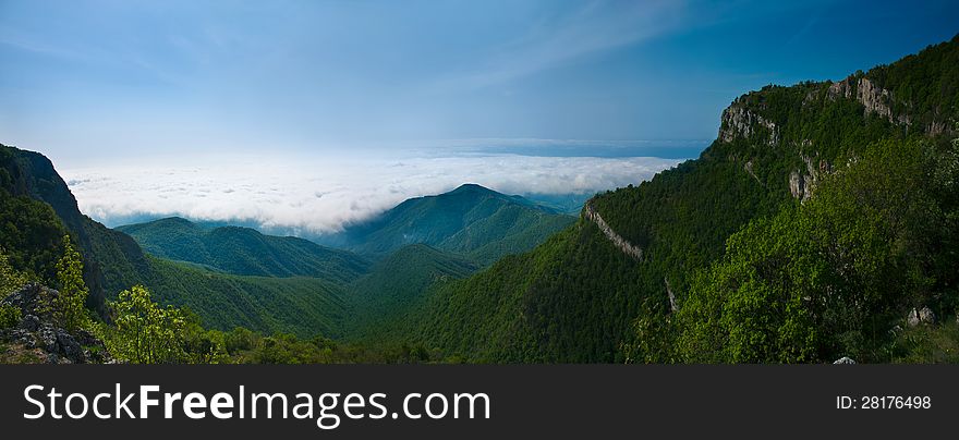 Panorama of mountains with clouds. Panorama of mountains with clouds