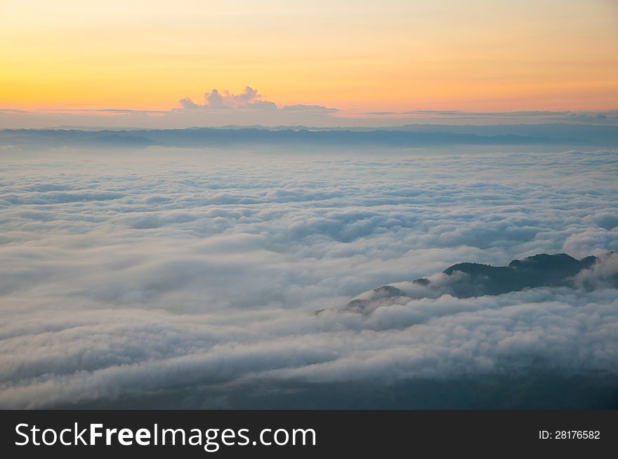 Top of the mountain over the fog. Top of the mountain over the fog