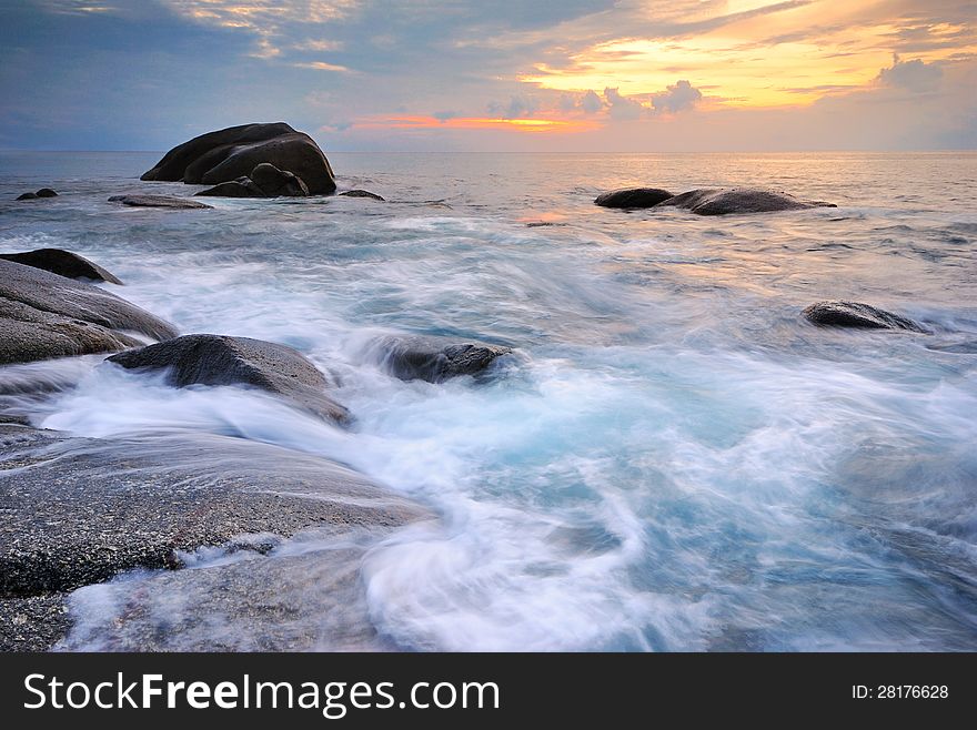 Sea waves lash line impact rock on the beach. Sea waves lash line impact rock on the beach