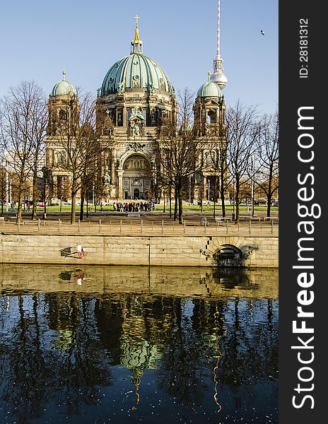 View of the Berliner Dome from the other side of river Spree. Located on Museum Island in the Mitte borough, Berlin. View of the Berliner Dome from the other side of river Spree. Located on Museum Island in the Mitte borough, Berlin.
