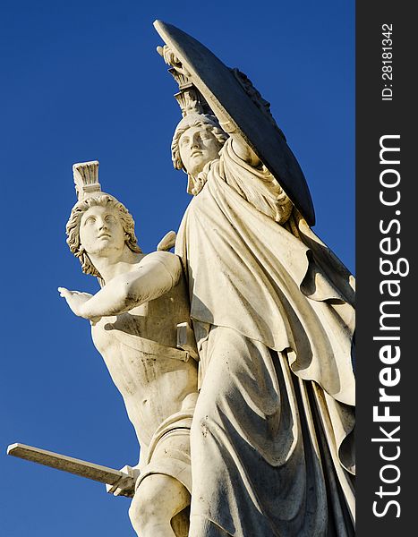 A youth attacking the enemy, protected by Athene at his side, statue on Schlossbrucke bridge , Berlin