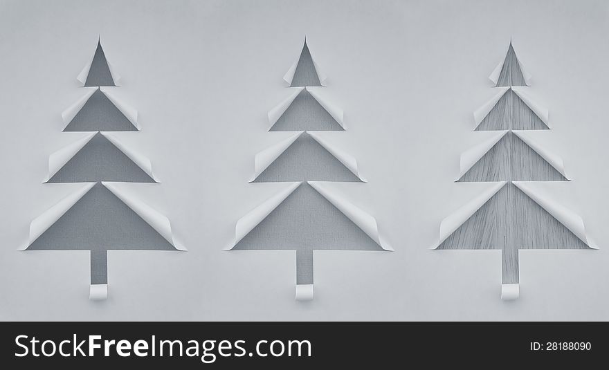 Three Christmas trees made of paper for design