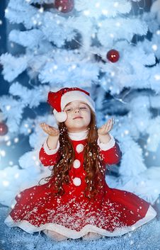 Little Girl Dressed As Santa Claus Royalty Free Stock Image