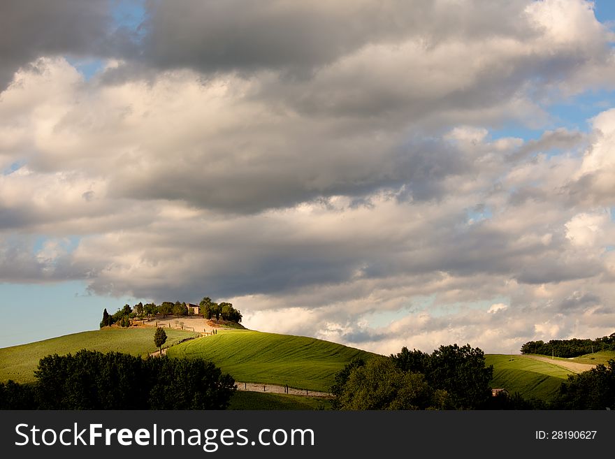 Typical tuscan countryside with farm and meadow. Typical tuscan countryside with farm and meadow