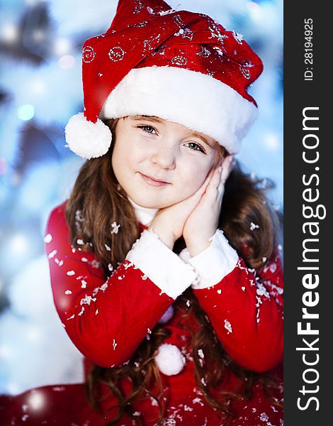 Cute girl and Christmas Tree