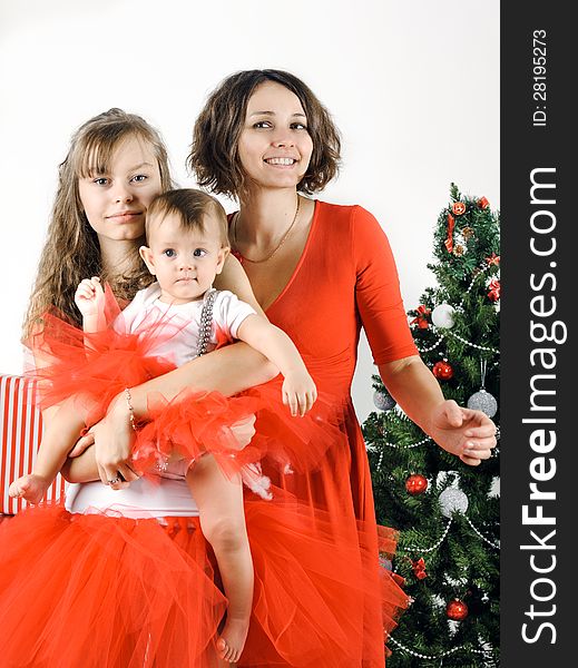 Happy and smiling Christmas family in a studio. Happy and smiling Christmas family in a studio