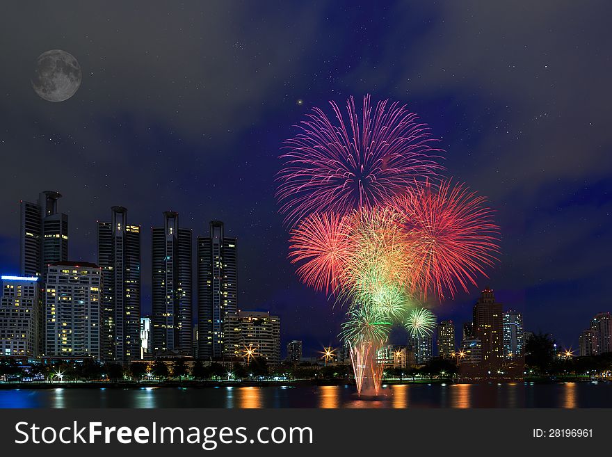 Fireworks over building cityscape, Bangkok Thailand