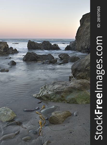 Exposure of a coastal tide surging through a cove. Exposure of a coastal tide surging through a cove.