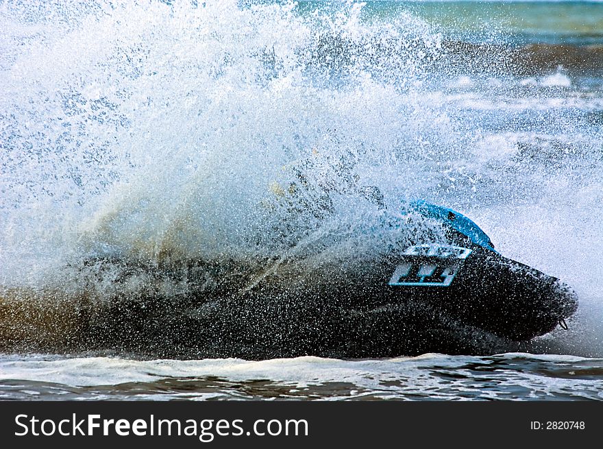 Extreme jet-ski watersports with big waves. Extreme jet-ski watersports with big waves