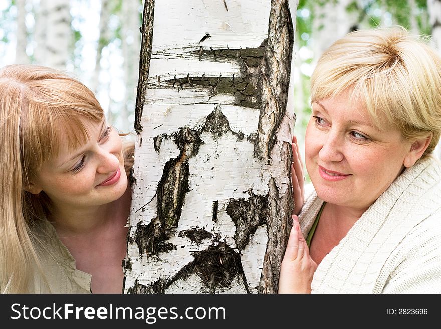 Happy loving mother and daughter outdoors. Happy loving mother and daughter outdoors