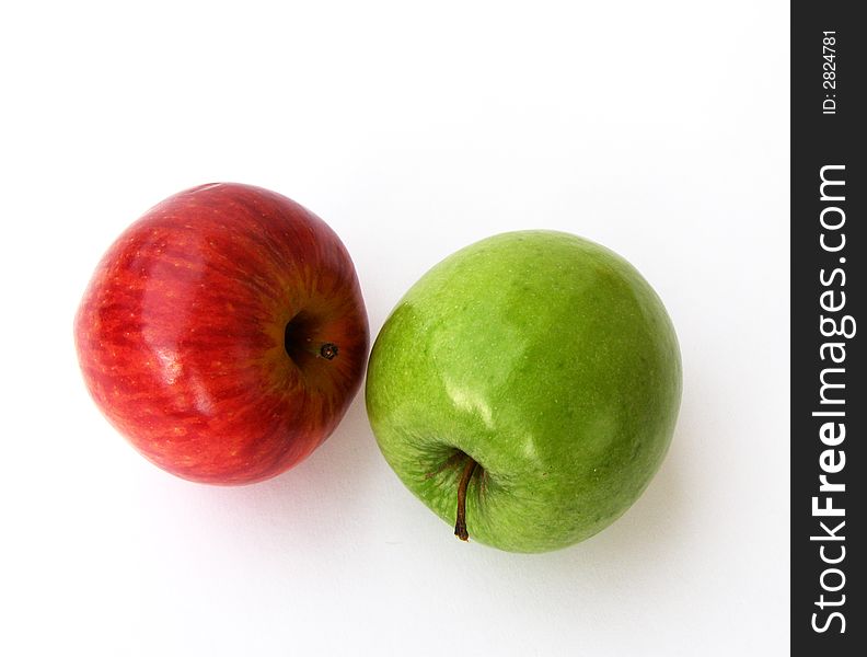 Green and red apples on a white background. Green and red apples on a white background.