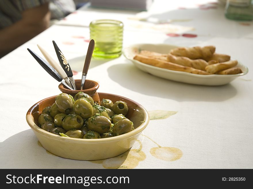 Olives as a snack on a party in the garden
