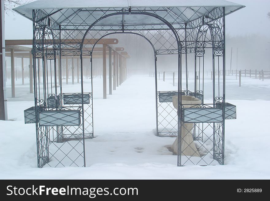 Looking through an arch on a foggy, snowy, morning, perspective & mystery. Looking through an arch on a foggy, snowy, morning, perspective & mystery