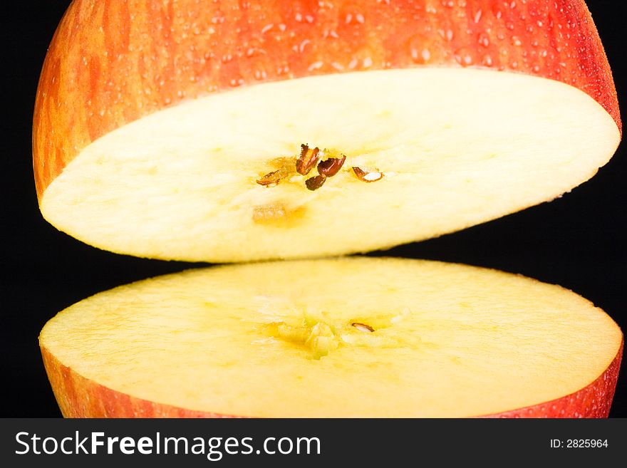 Red Apple on black background