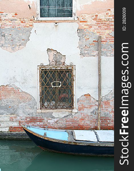 Venice - ship in sea canal with old building