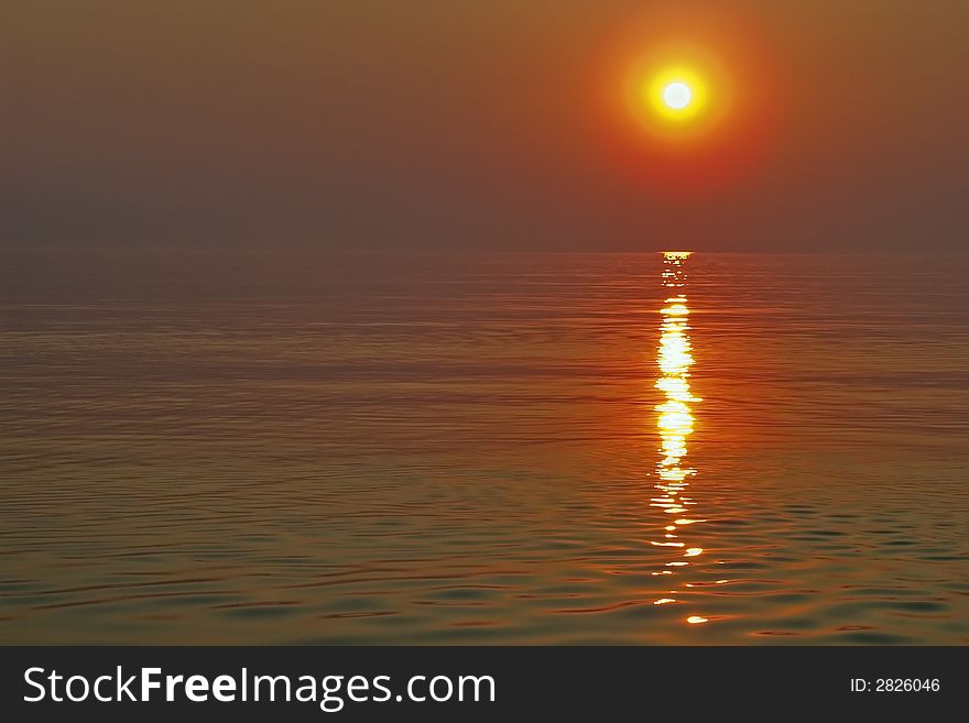 Sunset reflecting on the red sea. Sunset reflecting on the red sea