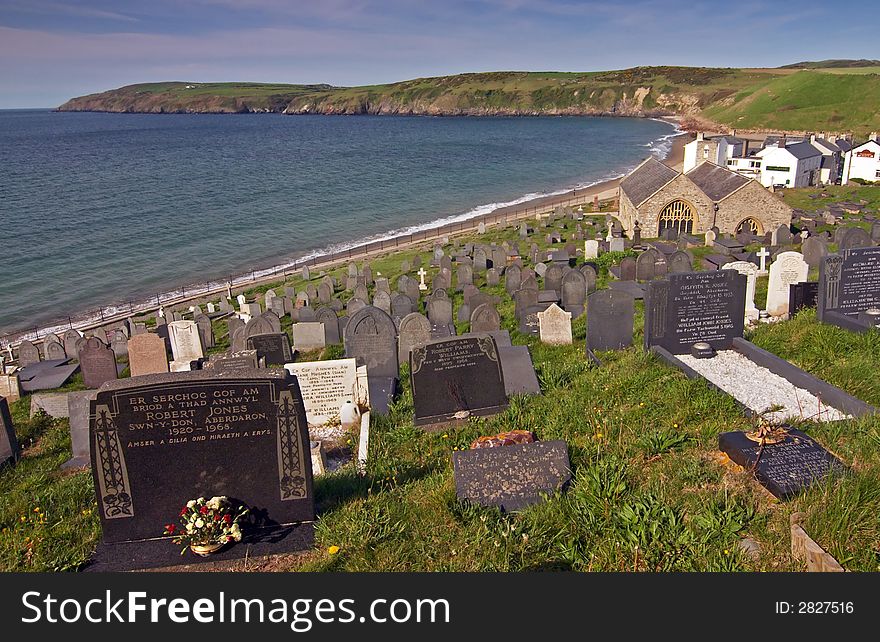 Aberdaron cemetery with view on sea, Wales