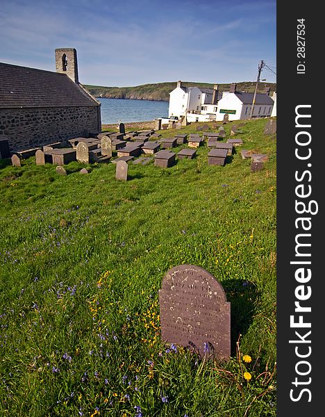 Aberdaron cemetery with view on sea, Wales