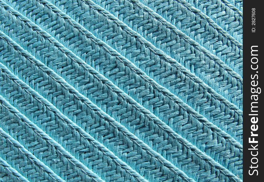 A closeup of a blue texture made of rope. A closeup of a blue texture made of rope