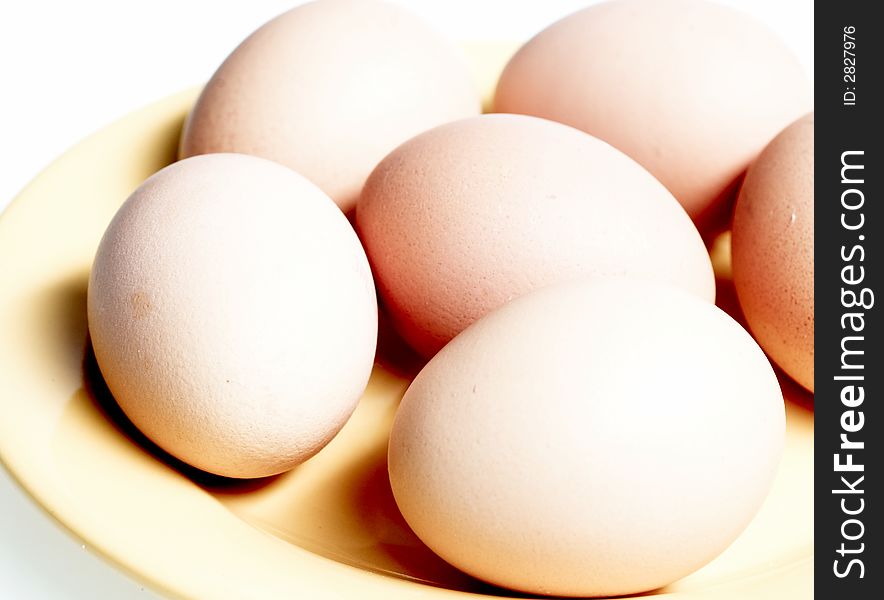 Photo of six eggs on plate