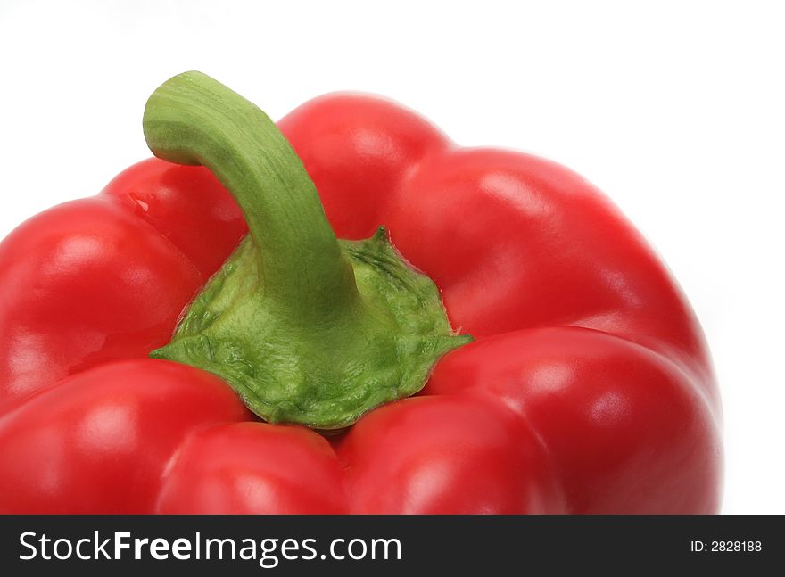 Red pepper extreme close up over white background