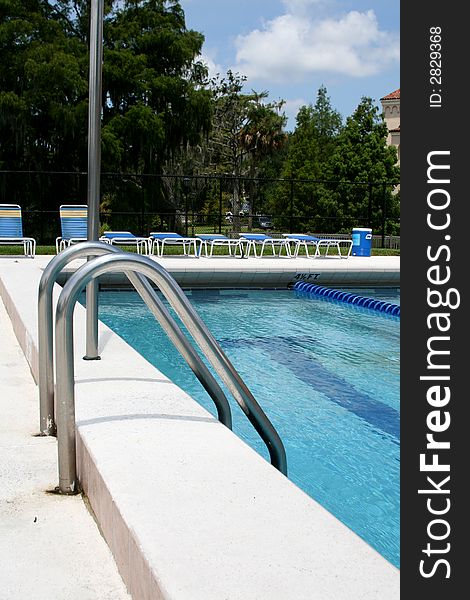 Ladder of a pool at a local college in Orlando, Florida. Ladder of a pool at a local college in Orlando, Florida