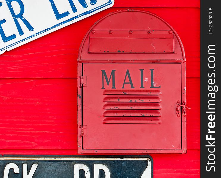 The red mail box hung wall